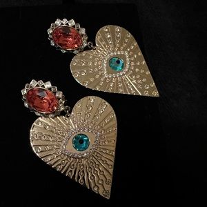 Swarovski  goddess evil eye heart clip earrings .NWOT